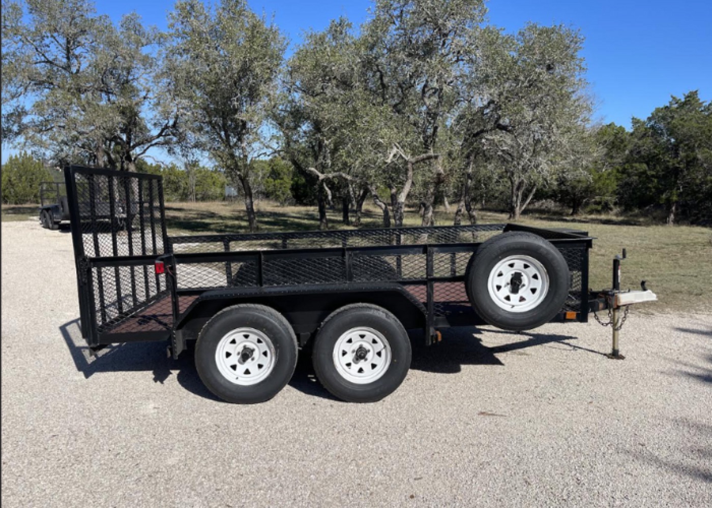 Tow N' Go Trailer Rental fleet lined up in a field in Bulverde, TX